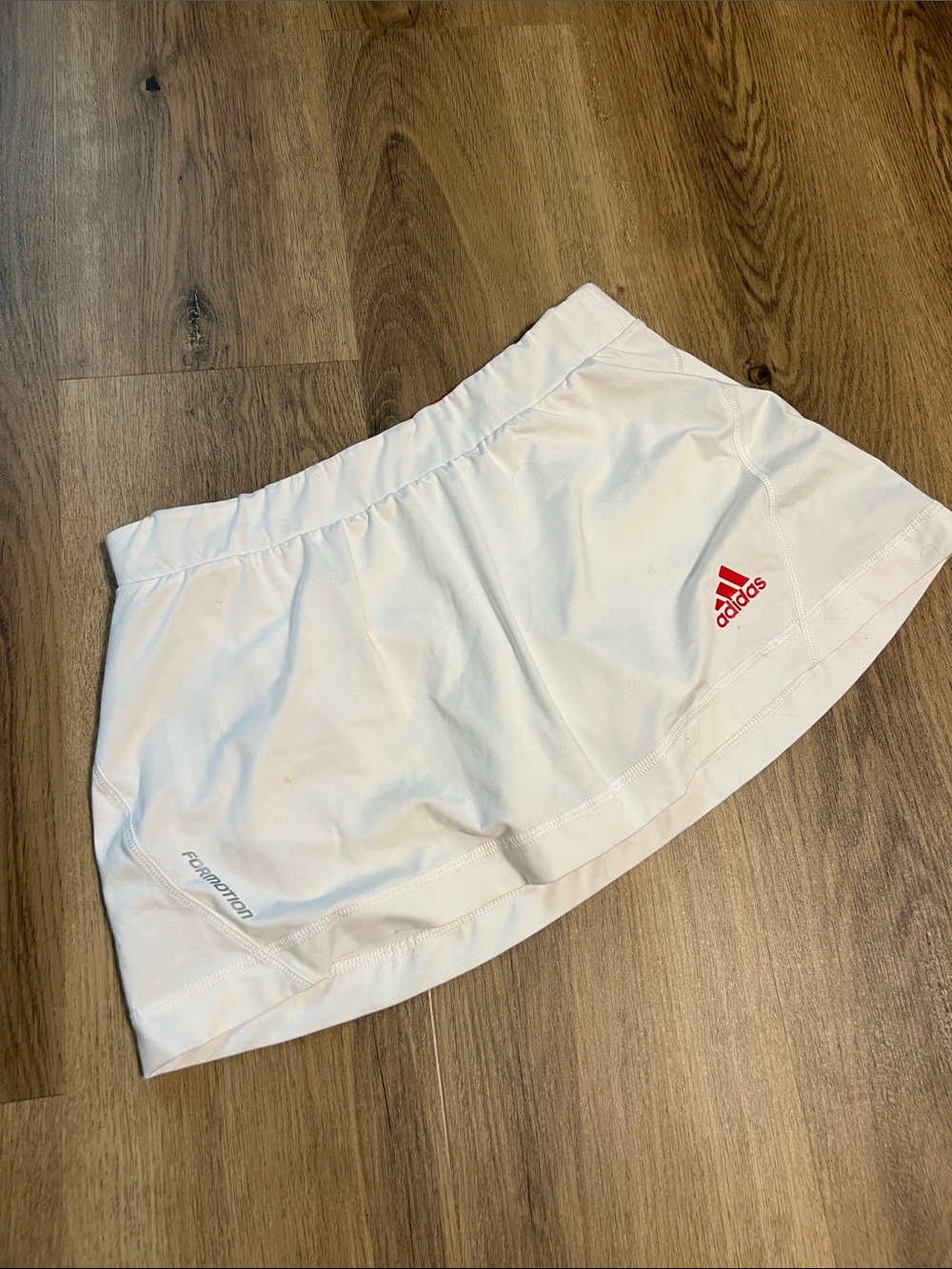 adidas White Tennis Skort with red/orange Logo